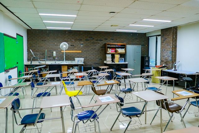 An empty public school classroom.